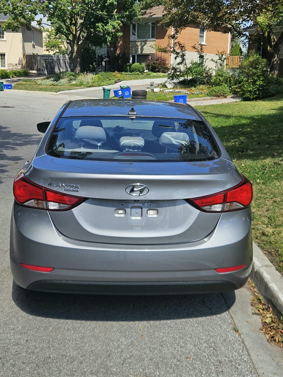 Rear view of the 2016 Hyundai Elantra with intact tail lights