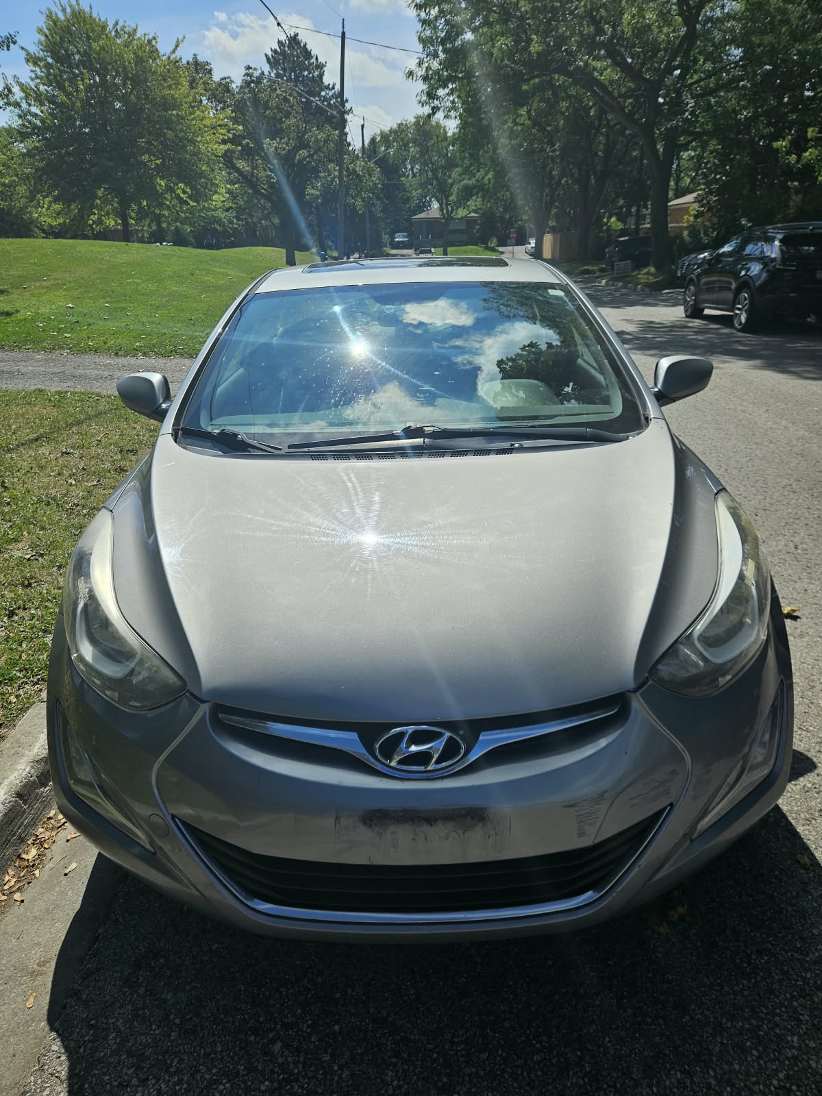 Front view of the 2016 Hyundai Elantra showing grille and headlights
